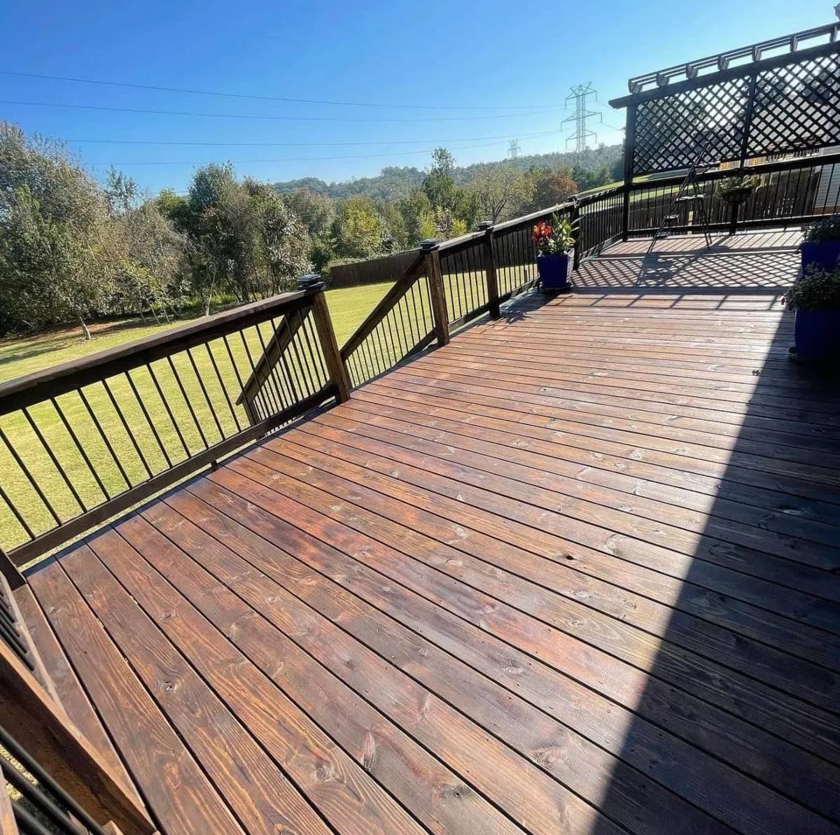 Refinished Cherry-Stained Deck completed in Roebuck, SC by Stateside Fence and Deck