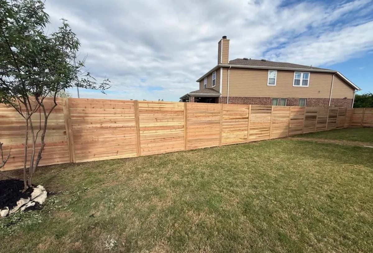 Horizontal Cedar Fence Line completed in Greenville, SC by Stateside Fence and Deck