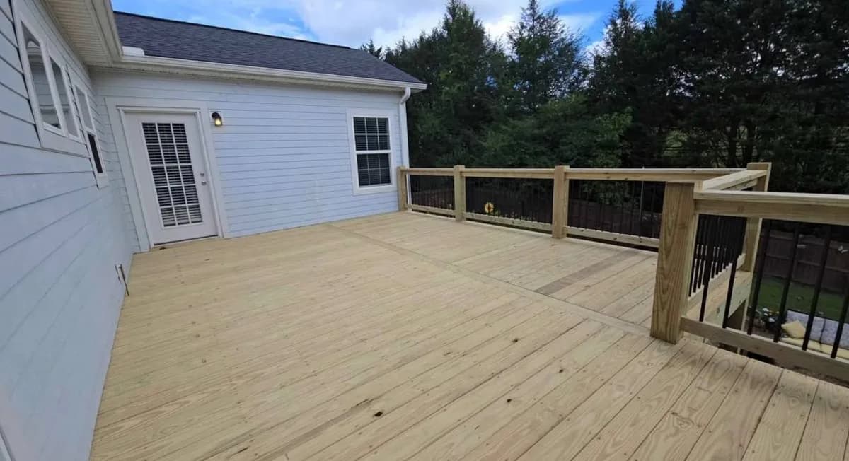 Backyard Deck with Black Spindles completed in Spartanburg, SC by Stateside Fence and Deck